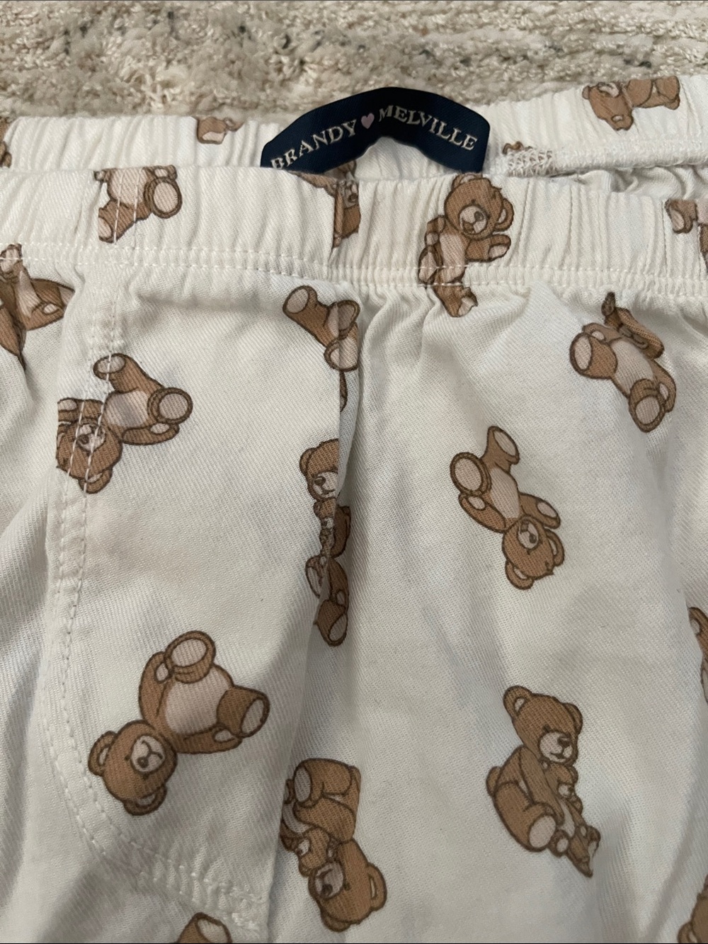 Brandy Melville Cream Pants with Brown Teddy Print - Picture 2 of 2